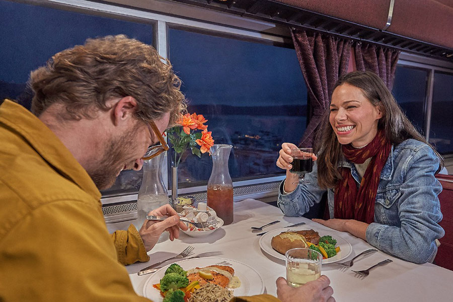 Couple enjoying dinner in Auto Train dining car
